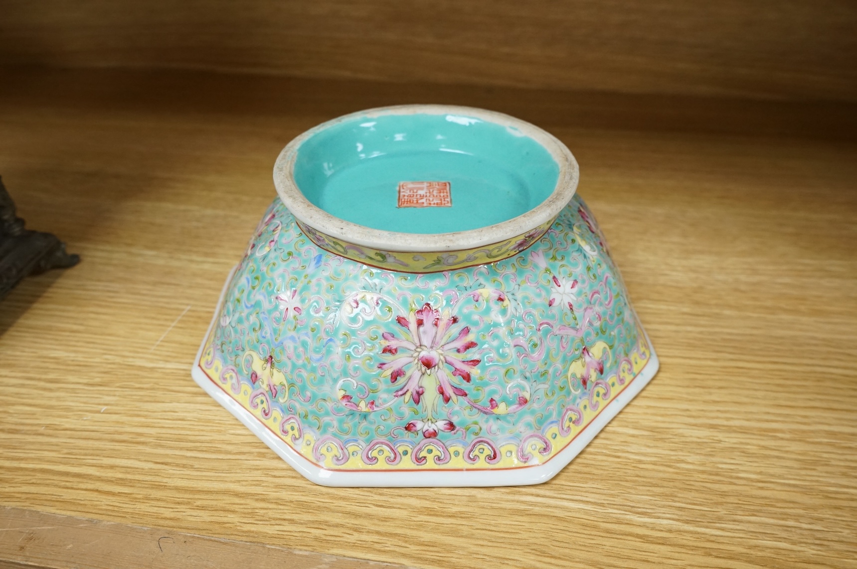 A Chinese enamelled porcelain turquoise ground hexagonal dish, Qianlong mark, late 19th century, 21cm in diameter